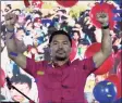  ?? / Associated Press ?? Senator Manny Pacquiao raises his hands during a national convention of his PDP-Laban party on Sunday in Quezon city, Philippine­s.