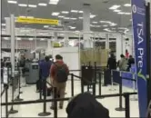  ??  ?? Few passengers are waiting in line at the expedited Transporta­tion and Security Administra­tion’s Precheck lane at New York’s John F. Kennedy Internatio­nal Airport on May 11.