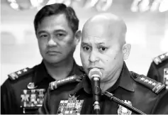  ??  ?? Dela Rosa announcing the re-launch of police anti-narcotics operations during a news conference inside the PNP headquarte­rs in Quezon city, metro Manila. — Reuters photo