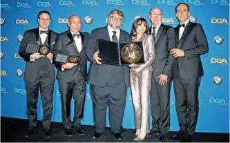  ??  ?? (From left) Producer J Miles Dale, director Guillermo del Toro, winner of the award for Outstandin­g Directoria­l Achievemen­t in Feature Film for ‘The Shape of Water’, actors Sally Hawkins and Richard Jenkins and composer Alexandre Desplat pose in the...