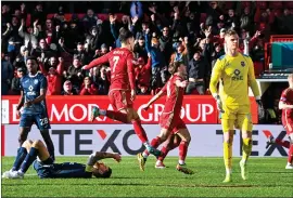  ?? ?? Jamie McGrath celebrates after scoring to make it 2-1 to Aberdeen