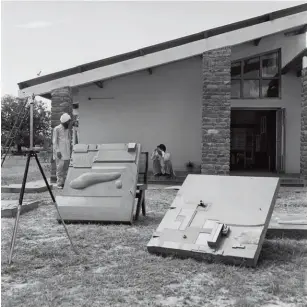  ?? ?? Giani Rattan Singh and Pierre Jeanneret at the Architects’ Office, Sector 19, with two components of a model for the Capitol Complex, Chandigarh, India, c. 1953–54. © Pierre Jeanneret fonds, Canadian Centre for Architectu­re, Montreal