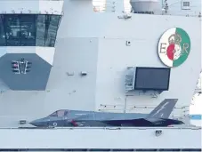  ??  ?? A stealth fighter on board HMS Queen Elizabeth.