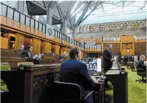  ?? SEAN KILPATRICK
THE CANADIAN PRESS ?? Members of Parliament are pictured on a computer screen during a hybrid House of Commons meeting on Wednesday.