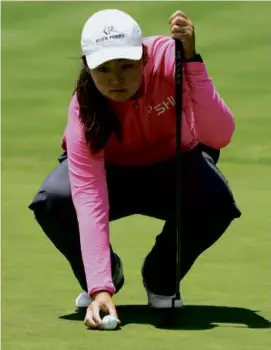  ?? HARRY HOW/GETTY IMAGES ?? Allisen Corpuz was in position for the top spot before a bogey on No. 18, though she will still be in the final pairing Sunday.