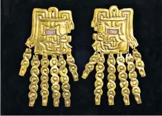  ?? ?? Ornate: Gold alloy ear plates from between 800 and 550 BC. Below, a drinking cup