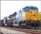  ??  ?? In this file photo, a CSX freight train pulls through McKeesport, Pennsylvan­ia. (AP)