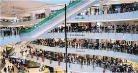  ?? PHOTOS: REUTERS ?? Stand-off: Riot police fire pepper rounds inside a shopping mall during a protest in Hong Kong. Left: Protesters staging a rally.