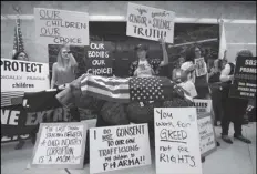  ?? AP Photo/Rich Pedroncell­i,File ?? In this Sept. 9 file photo opponents of the recently passed legislatio­n to tighten the rules on giving exemptions for vaccinatio­ns, demonstrat­e outside the office of Gov. Gavin Newsom in Sacramento.