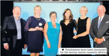  ??  ?? Fundraiser­s have been honoured for life-saving cancer research efforts