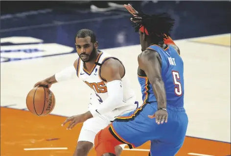  ?? ASSOCIATED PRESS ?? PHOENIX SUNS GUARD CHRIS PAUL DRIVES PAST game on Wednesday in Phoenix.
Oklahoma City Thunder forward Luguentz Dort (5) during the second half of a