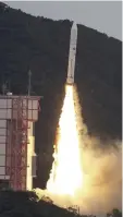  ?? The Yomiuri Shimbun ?? The Epsilon-6 rocket takes off from Uchinoura Space Center in Kagoshima Prefecture at 9:50 a.m. Wednesday.