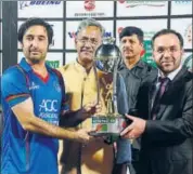  ?? VINAY SANTOSH KUMAR/HT ?? Skipper Asghar Stanikzai (left) will lead Afghanista­n in their debut Test against India in Bangalore next week.