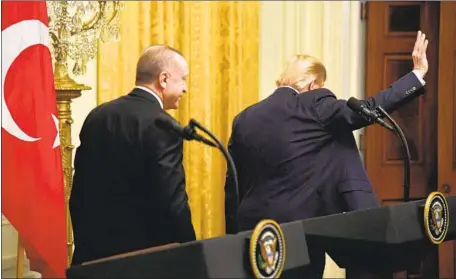  ?? Mike Theiler Pool Photo ?? PRESIDENT TRUMP’S embrace of Turkish autocrat Recep Tayyip Erdogan, left, provided a symbolic subtext to the day’s events.