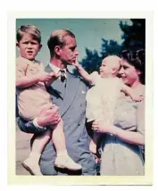  ?? ?? Queen Elizabeth and Prince Philip with Prince Charles and Princess Anne in 1952.