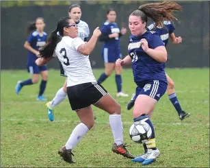  ??  ?? Davies Tech sophomore Lilian Santos (3) battles for possession of the ball in her team’s 2-1 defeat to No. 8 Blackstone Valley Prep