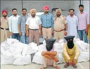  ?? HT FILE ?? Two men accused of smuggling liquor from Haryana in police custody in Bathinda.