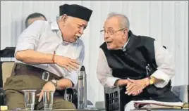  ?? AP PHOTO ?? Former President Pranab Mukherjee (right) interacts with RSS chief Mohan Bhagwat during an event in Nagpur on Thursday.