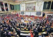  ?? REUTERS ?? Members of parliament applaud after a vote to enshrine abortion rights in the constituti­on, at the National Assembly in Paris.