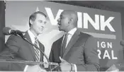  ?? WILFREDO LEE/AP ?? Chris King, left, and Andrew Gillum share the stage in this July 18 file photo. The two made their first campaign stop together on Saturday in Orlando.