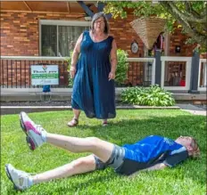  ?? Steph Chambers/Post-Gazette ?? Special Olympian Jessica Clayton works on her backstroke while her mother, Pam Clayton, watches Wednesday in Bethel Park. Ms. Clayton is competing for the first time as a swimmer in the virtual summer games.