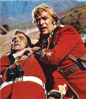  ??  ?? Battle site: A scene from the film Zulu, starring Stanley Baker and Michael Caine as officers at the defence of Rorke’s Drift