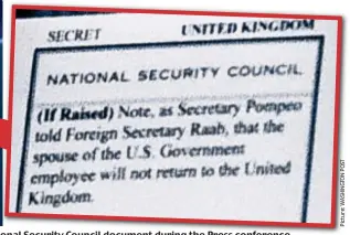  ??  ?? ‘Complete fool’: Trump accidental­ly reveals the National onal Security Council document during the Press conference