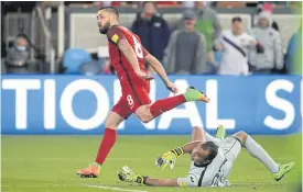  ??  ?? US forward Clint Dempsey scores against Honduras.