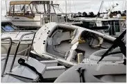  ?? ASSOCIATED PRESS ?? Boats are piled on top of each other at the Southport Marina following the effects of Hurricane Isaias in Southport, North Carolina on Tuesday.