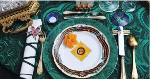  ??  ?? This vignette by Hutton Wilkinson and Josh Hildreth is set for tea with a Russian dancer, and the table is filled with luxurious items including starfish napkin rings.