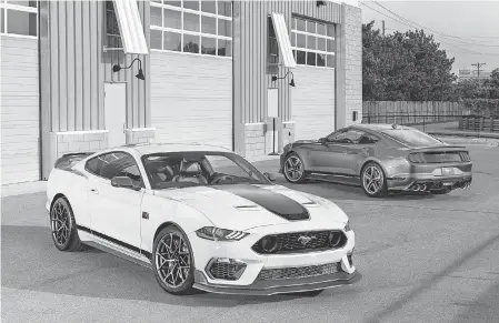  ??  ?? The 2021 Mustang Mach 1 sports a unique hood with stripes in three colors. PHOTOS COURTESY OF FORD MOTOR CO.