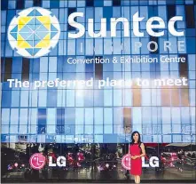  ??  ?? A sought-after speaker and lecturer, Dr. Vicki Belo in front of Suntec Singapore, a world-renowned, internatio­nal venue for convention­s and exhibition­s