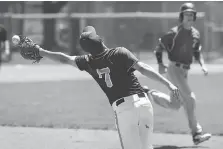  ?? DAN JANISSE ?? Ross Royals third baseman Spencer Bertelsen can’t get a handle on a pop up during a game against the St. Anne Saints during the OFSAA West Regional baseball championsh­ip in Tecumseh on Wednesday.