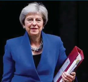  ?? BLOOMBERG PIC ?? The Sunday Times has reported that Prime Minister Theresa May is planning a Customs deal that will be written into the legally binding agreement governing Britain’s withdrawal from the European Union.