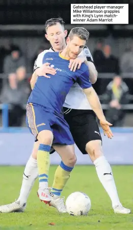  ??  ?? Gateshead player-manager Mike Williamson grapples with King’s Lynn matchwinne­r Adam Marriot