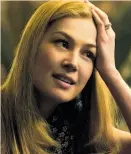  ?? Merrick Morton /20th Century Fox ?? Rosamund Pike in “Gone Girl,” which disappoint­ed some readers of the novel.