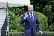  ?? SUSAN WALSH-ASSOCIATED PRESS ?? President Joe Biden tries to hear questions shouted by reporters as he heads to Marine One on the South Lawn of the White House in Washington, Friday.