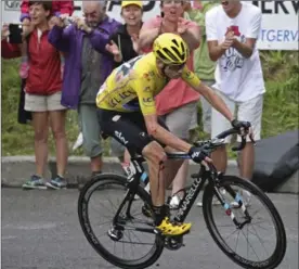  ?? KENO TRIBOUILLA­RD, THE ASSOCIATED PRESS ?? Britain’s Chris Froome, in his torn overall leader’s yellow jersey, bleeds after crashing during the 19th stage of the Tour de France Friday.