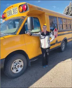  ?? ?? School bus contractor Suzanna Santos with her bus. Santos has one of the longest bus routes in the area, with approximat­ely a three-hour drive both in the morning and afternoon every school day.