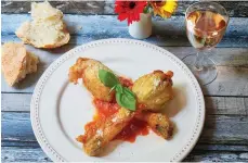  ?? Associated Press ?? ■ Stuffed Fried Zucchini Blossoms and Marinara.