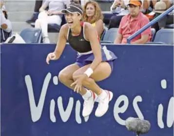  ?? | ISRAEL SALAZAR ?? Garbiñe Muguruza celebró efusivamen­te su triunfo sobre Timea Babos.