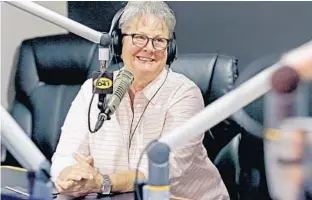 ?? RED HUBER/STAFF PHOTOGRAPH­ER ?? Central Florida Crimeline executive director Barb Bergin talks Feb. 14 during Real Radio 104.1’s “Monsters in the Morning” talk show. Bergin brings attention to Crimeline through radio and television.