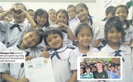  ??  ?? Cheque this Some of the youngsters say a big thank you (and pictured with Reamonn)