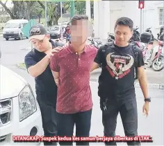  ??  ?? DITANGKAP: Suspek kedua kes samun berjaya diberkas di LTAK.