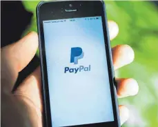  ?? FOTO: DPA ?? In Deutschlan­d hat PayPal fast 19 Millionen Kunden. Doch die Geschäftsb­edingungen sind nicht sehr transparen­t.