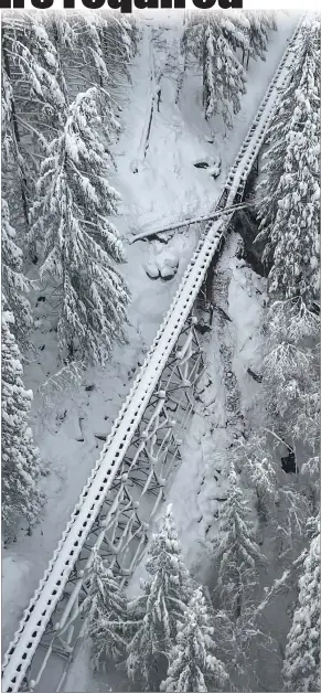  ?? Courtesy photo
/ PG&E ?? Pacific Gas & Electric crews found a break in a Flume A on the Main Canaltuesd­ay afternoon caused by a snow-laden tree. PG&E expected repairs to the flume to be completed by Saturday.the canal supplies 95% of the weather used bytuolumne Utilities District customers.