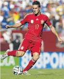  ?? Pictures: REUTERS/AFP ?? RISING STARS: Both Isco, left, on the ball, and Koke, right, played pivotal roles in Spain’s victory against Belarus