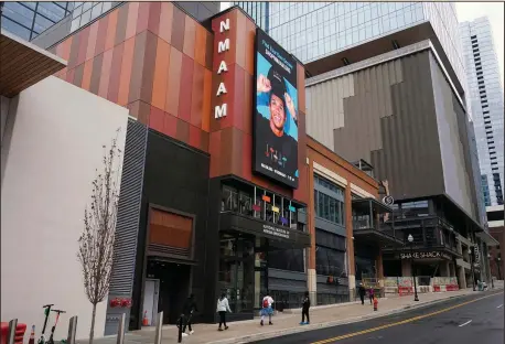  ?? (AP Photo/Mark Humphrey) ?? Visitors approach the entrance of the National Museum of African American Music on Jan. 30 in Nashville, Tenn. This new museum is the first to span multiple genres including gospel, blues, jazz, R&B and hip hop.