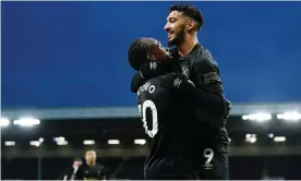  ??  ?? Michail Antonio celebrates with Saïd Benrahma after scoring West Ham’s second goal at Burnley. Photograph: Getty Images