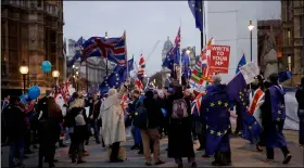  ?? aP PhoTo/ MaTT DunhaM ?? Anti-Brexit supporters take part in a protest across the street from the Houses of Parliament in London, on Monday.